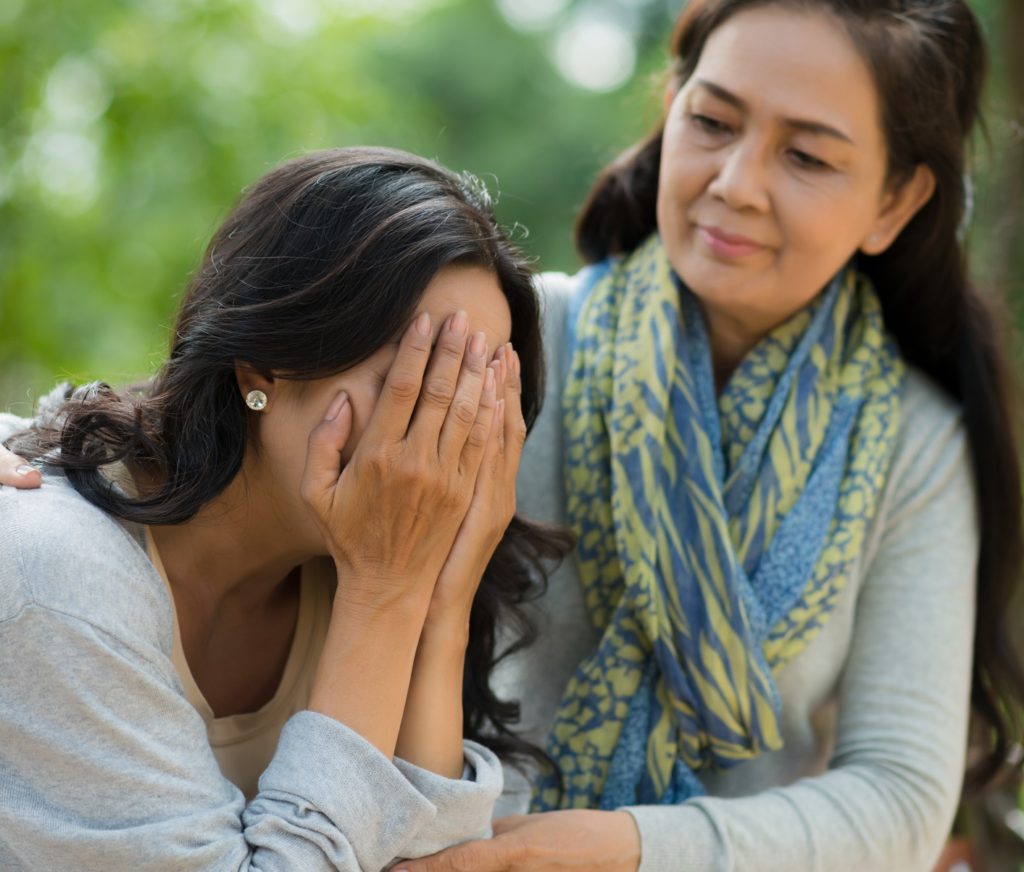 family caregiver comforting loved one